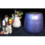 Two 'The Leonardo Collection' fine porcelain figurines of 'The Balloon lady' and 'The Balloon man'.