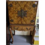 Reproduction walnut two door blind panelled cocktail cabinet on stand. (B.P. 24% incl.