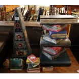 Modern novelty table in the form of stacked books, together with other similar items. (B.P.