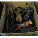 Box of assorted items to include carved wooden studies of figures and animals,