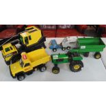 Collection of tin plate Tonka toys to include; tractor and trailer, motor mover,