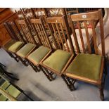 Set of six early 20th Century oak slat back dining chairs on barley twist supports. (6) (B.P.