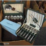 Box of assorted cased cutlery, loose plated cutlery, Wedgwood silver plated napkins rings etc. (B.P.