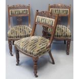 A SET OF SIX VICTORIAN WALNUT SIDE CHAIRS having carved foliate and lyre back decoration with stuff