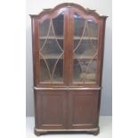 EARLY 19TH CENTURY MAHOGANY TWO STAGE CORNER CABINET, having shaped moulded cornice,