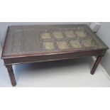 UNUSUAL MIDDLE EASTERN STAINED AND COPIOUSLY CARVED WOODEN DINING TABLE,