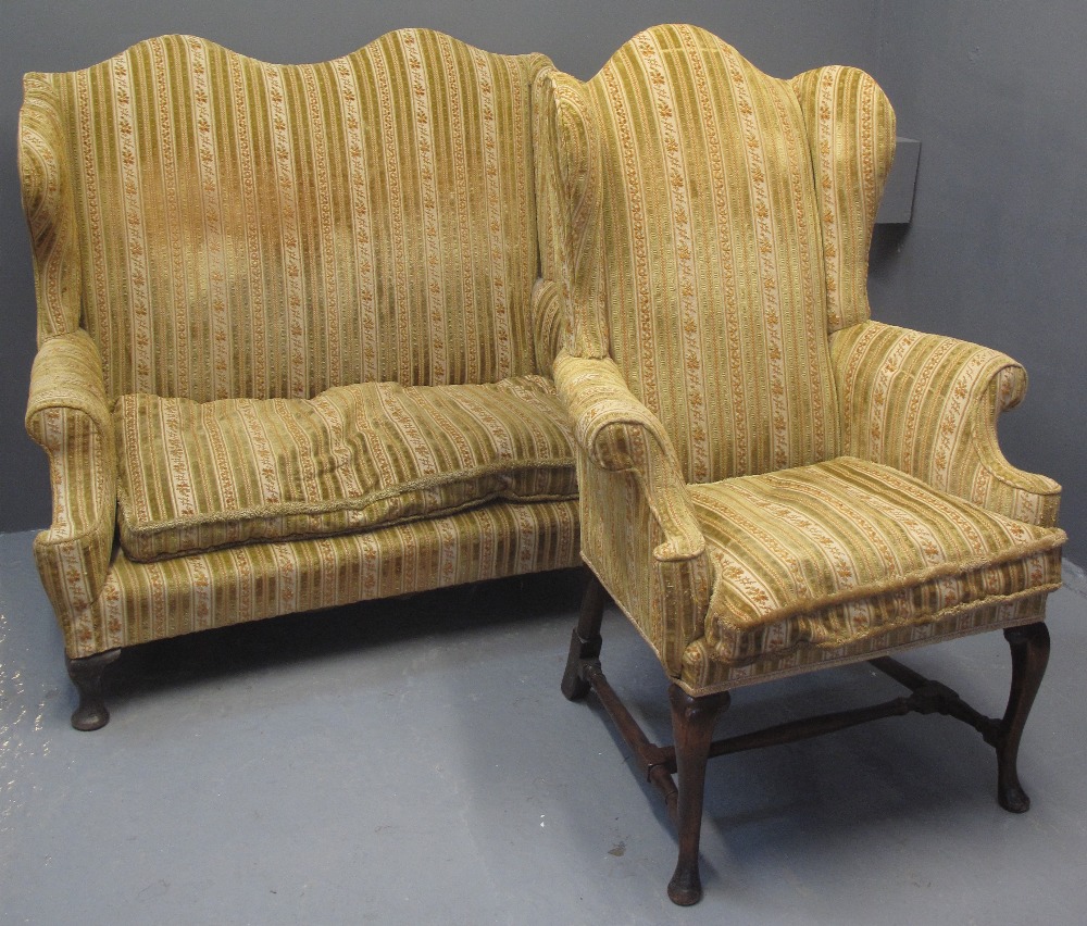 QUEEN ANNE STYLE UPHOLSTERED TWO SEATER WING SOFA with scroll over arms and loose cushion on