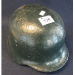 World War I German helmet with swastika to the side. (B.P. 24% incl.
