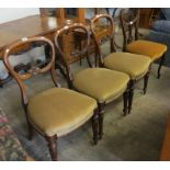 Set of three Victorian rosewood balloon back dining chairs,