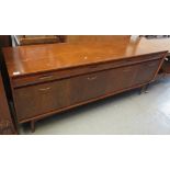 1960's teak sideboard, together with teak drinks trolley on wheels. (2) (B.P. 24% incl.