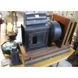 Late 19th/early 20th Century magic lantern projector having 'Grosvenor Enlarger' with lens.