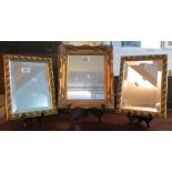 A pair of modern small bevel plate mirrors,