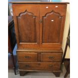 19th Century oak Welsh linen press type cupboard of small proportions,