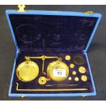 Cased set of brass miniature apothecary scales and weights. (B.P. 24% incl.
