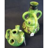 Green glazed pottery four handled vase with foliate decoration, together with another green glazed,