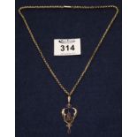 9ct gold Art Nouveau pendant set with two amethysts and seed pearls on a 9ct gold chain.