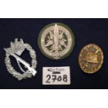 Three Second World War German badges to include: SA Gruppe Hochland,