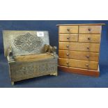 Miniature model of a carved oak monks' bench, together with a miniature mahogany chest of drawers.