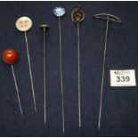 A collection of antique silver hat pins. (B.P. 24% incl.