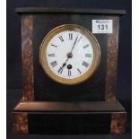 Late Victorian slate and marble single train mantel clock with enamelled face and Roman numerals.