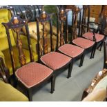 Set of five Edwardian mahogany Art Nouveau high back chairs, overall with organic decoration.