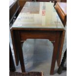 Late 18th/early 19th Century mahogany drop-leaf table with associated glass top. (B.P. 24% incl.