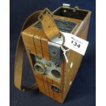 Courtnay Magna IIIE wooden cased accumulator battery with leather caddie handle. (B.P. 24% incl.