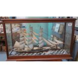 Cased marine scratch built naive model of a three masted British Clipper ship under full sail with