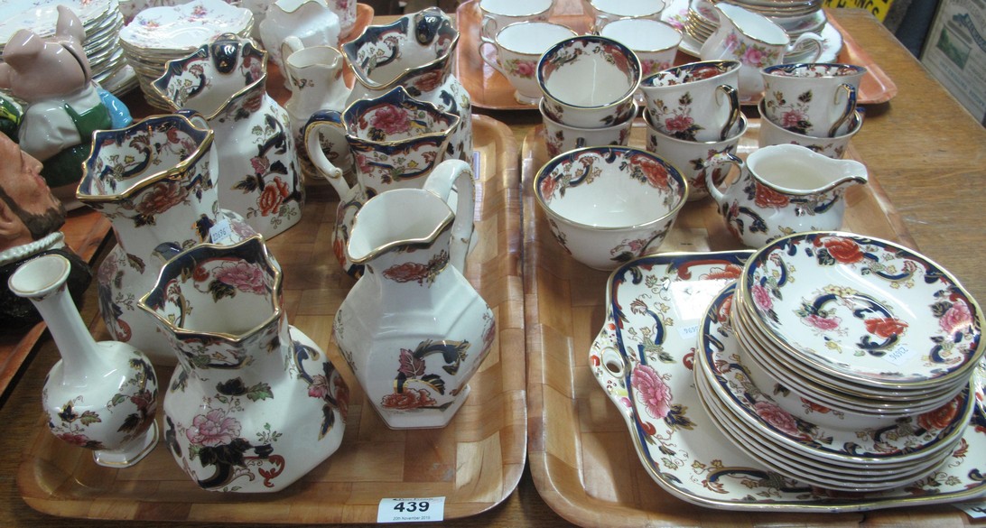 Two trays of Masons Mandalay design ironstone items to include; pouch shaped dresser jugs,