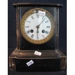 Late Victorian slate and marble two train mantel clock with enamelled face and Roman numerals. (B.P.