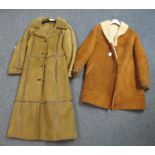 Two brown vintage sheepskin coats, one a calf length ladies coat with tie belt and leather piping,