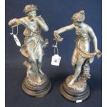 Pair of early 20th Century Spelter figurines on ebonised socle base,