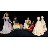 Two Royal Doulton bone china figurines to include;