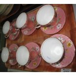 A set of six Aynsley bone china floral cabinet cups (pattern C2010) and saucers (pattern B4073).