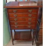 Edwardian mahogany music cabinet or chest, having five drawers with under tier,