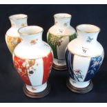 Set of four Japanese Ocura porcelain vases on hardwood bases with boxes. (4) (B.P. 24% incl.