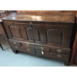 18th Century Welsh oak coffer now converted to a two door cupboard with fixed top over two doors to