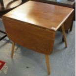 Elm Ercol drop-leaf kitchen table. (B.P. 24% incl.