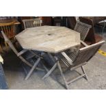 Modern teak octagonal garden table with four matching folding garden chairs. (B.P. 24% incl.