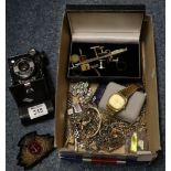 A collection of watches and costume jewellery including a camera. (B.P. 24% incl.
