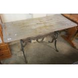 19th Century rectangular table, the cast iron base with scroll decoration. (B.P. 24% incl.