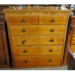 Edwardian oak straight front chest of two short and four long drawers,