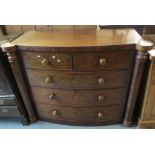Victorian mahogany bow front chest of two short and three long drawers with turned handles. (B.P.