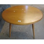 Elm Ercol style circular coffee table. (B.P. 24% incl.