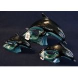 Three Poole pottery dolphin figurines. (3) (B.P. 24% incl.