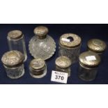 Bag containing assorted dressing table jars with silver tops, globular scent bottle etc. (B.P.