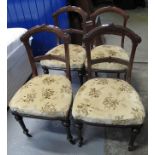 Set of four late 19th Century mahogany curve and bar back upholstered dining chairs on turned
