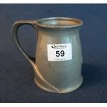 Early 20th Century Tudric beaten pewter Art Nouveau single handled jug.