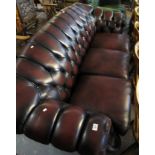 Thomas Lloyd burgundy leather chesterfield style three seater sofa. (B.P. 24% incl.