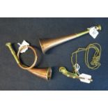 Miniature copper and brass post horn, bugle and brass and copper whistle on chain. (3) (B.P.